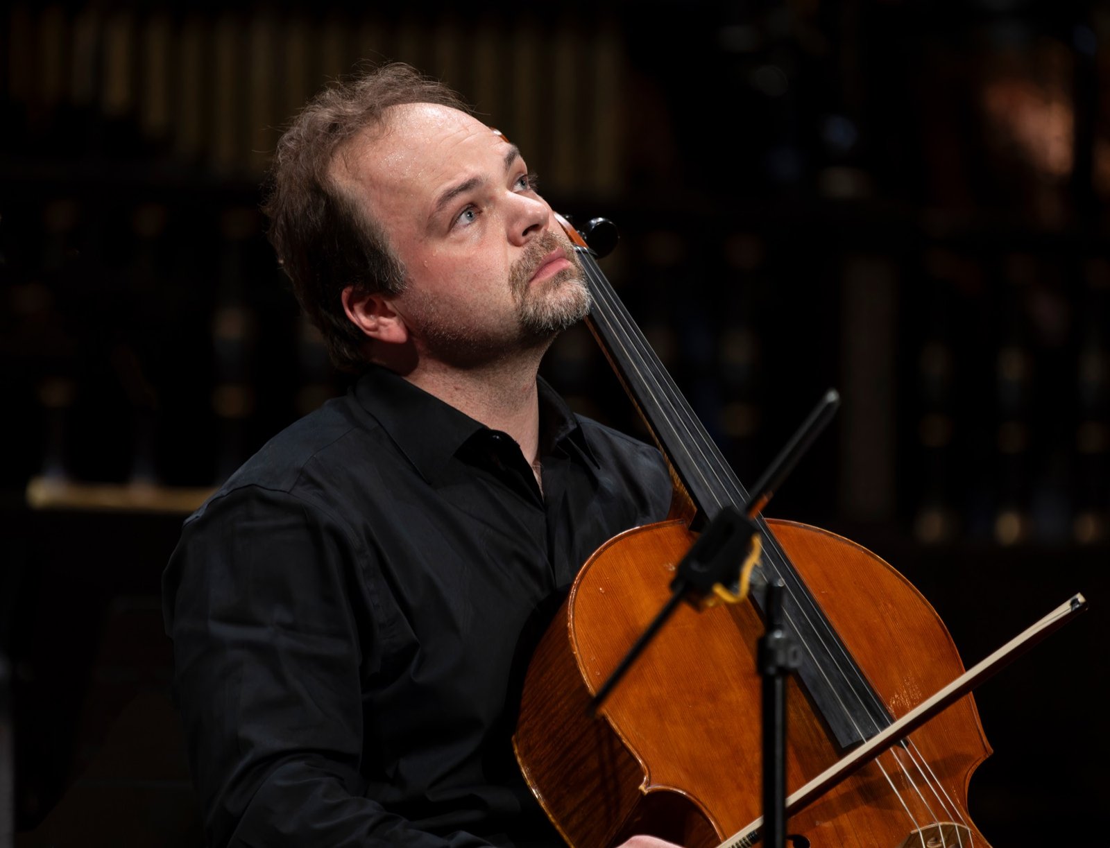 László Mező onstage with cello in Budapest